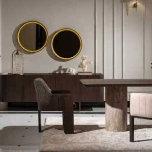 Palermo sideboard with dark wood veneer, travertine stone pillar, and brushed gold base; paired with a round led mirror.