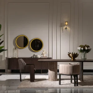 Palermo sideboard with dark wood veneer, travertine stone pillar, and brushed gold base; paired with a round led mirror.