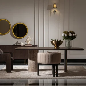 Palermo dining table with dark wood tabletop, travertine stone pillar, and brushed metal leg with gold accents.