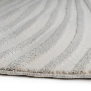 Round rug with a modern Solstice design, featuring soft polypropylene and shrink polyester material, in neutral tones with a 20mm pile height. Perfect for contemporary living spaces.