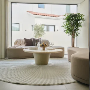 Round rug with a modern Solstice design, featuring soft polypropylene and shrink polyester material, in neutral tones with a 20mm pile height. Perfect for contemporary living spaces.