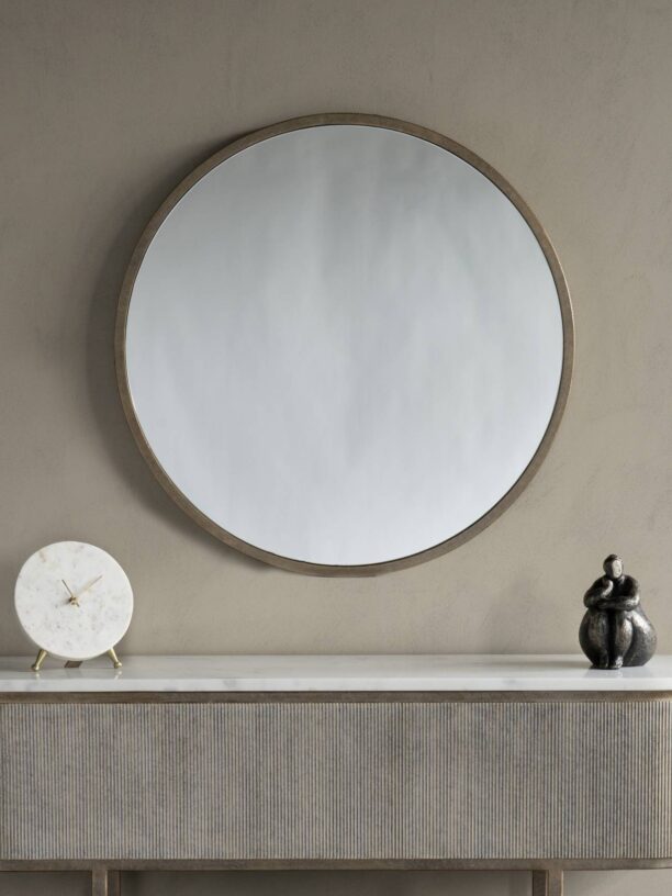 Transform your home with the elegant Knightsbridge Mirror. Round design, 79.5 cm wide, lightweight, and perfect for brightening any space.