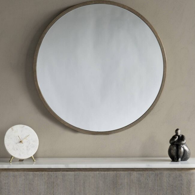 Transform your home with the elegant Knightsbridge Mirror. Round design, 79.5 cm wide, lightweight, and perfect for brightening any space.