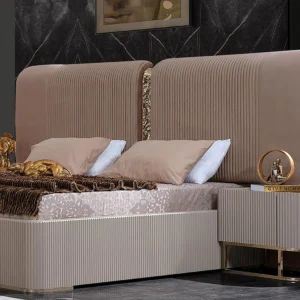 Lyon Luxury Bed with fluted headboard, gold detailing, and bespoke fabric options for a sophisticated bedroom design.