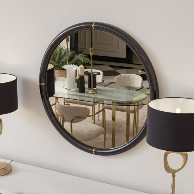 The Santorini Mirror combines timeless elegance with modern sophistication. Measuring 120 cm in diameter, this large round mirror is available in cream or black and accented with luxurious golden inserts around the edges. Its substantial size makes it a perfect statement piece, whether placed above a sideboard, in a hallway, or as a centerpiece in your living or dining area. Versatile and striking, the Santorini Mirror enhances natural light and adds a sense of spaciousness to any room.