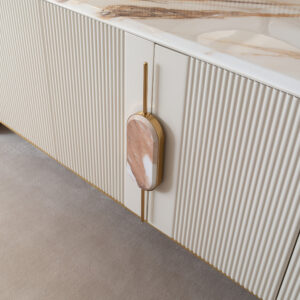 Elegant Tropez Sideboard in a luxury interior with marble top and gold accents.