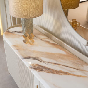 Elegant Tropez Sideboard in a luxury interior with marble top and gold accents.