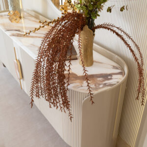 Elegant Tropez Sideboard in a luxury interior with marble top and gold accents.