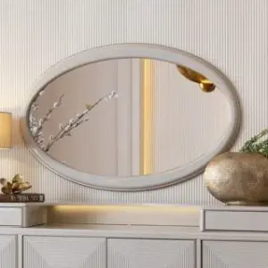 cream oval wall mirror