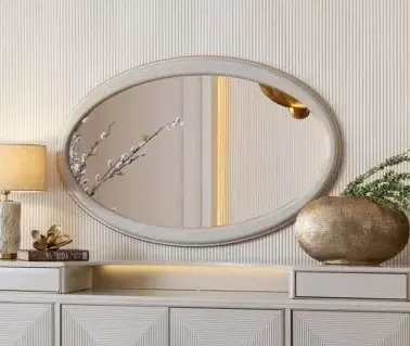cream oval wall mirror
