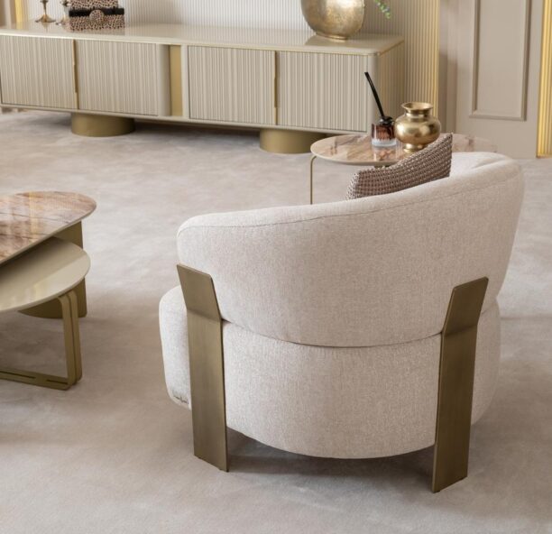 cream and brushed gold armchair
