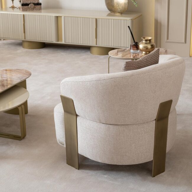 cream and brushed gold armchair